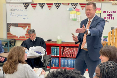 The lesson focused on the three branches of government and the structure of the U.S. Constitution.