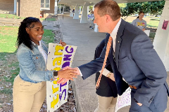 Louisiana State Superintendent of Education Dr. Cade Brumley is greeted by students as he arrives at Alexandria Senior High.